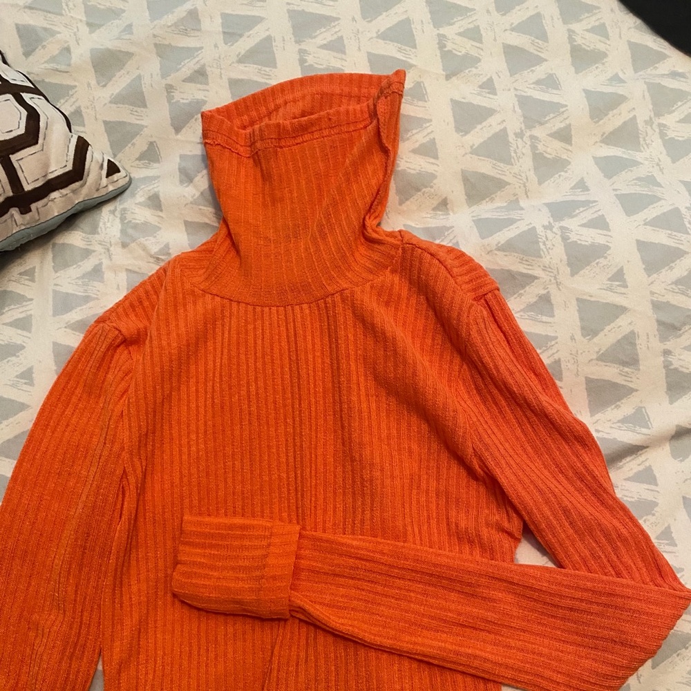 Orange turtleneck